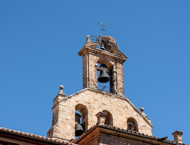 Stork nest on bell tower of Inglesia de San Martin de Tours in Salamanca Spain