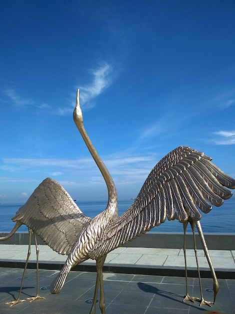 stork pelican statue at centre point makassar south sulawesi indonesia