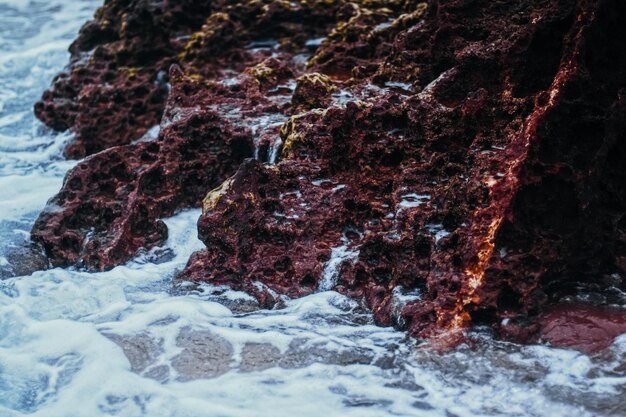 Storm in the ocean sea waves crashing on rocks on the beach coast nature and waterscape