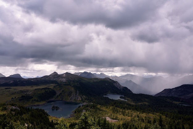 Storm and raining panorama of the Candian Rockies at Sunshine Village, Banff, Alberta, Canada