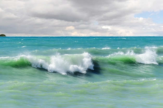 Storm waves on the sea shallows.