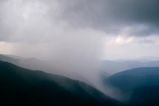 Stormy clouds above mountains