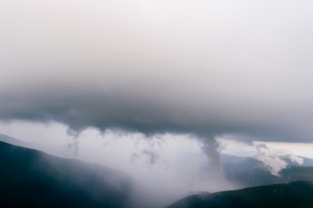 Stormy clouds above mountains