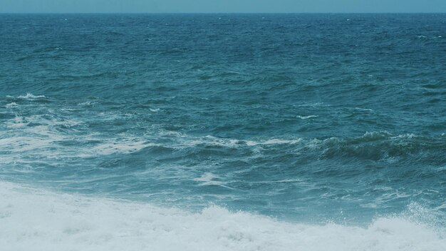 Stormy ocean crashing waves in different layers extreme stormy ocean waves splashing