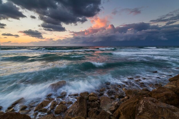 Stormy sky over the wave of the sea