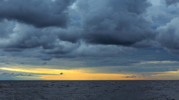 Stormy weather, panorama of beautiful sunset on Baltic sea. Latvia