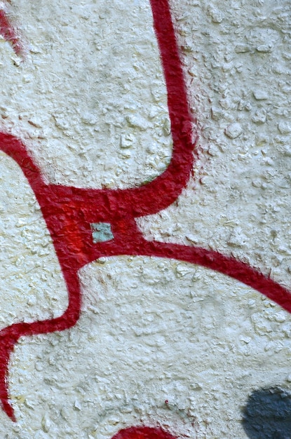 Straatkunst Abstracte achtergrondafbeelding van een fragment van een gekleurd graffiti schilderij in chroom en rode tinten