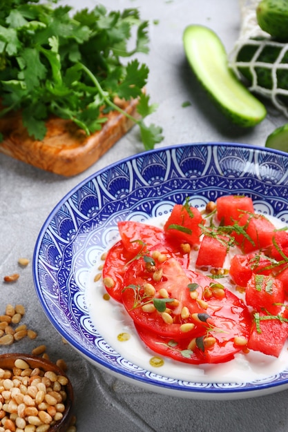 Stracciatella salad with tomatoes and watermelon