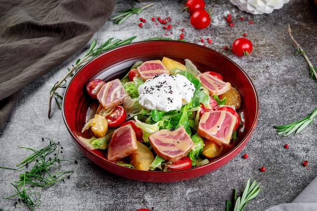 Strachatella Sea fresh green salad mix with tuna poached egg cherry tomatoes and potatoes