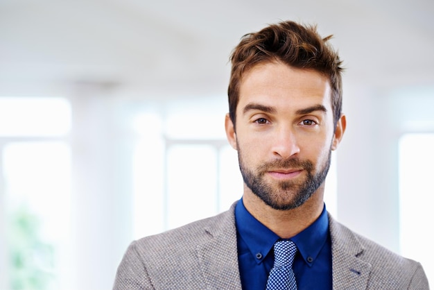 Straight forward handsome Portrait of a man in a contemporary suit