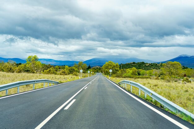 Straight mountain road that leads to the summits Guadarrama Madrid