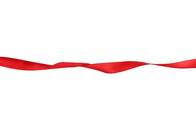 Photo straight red ribbon separates white background. high quality photo