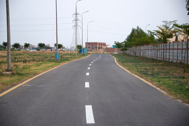 The straight rural road in Lahore city