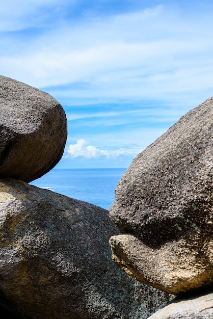 Strait between a rock background sea