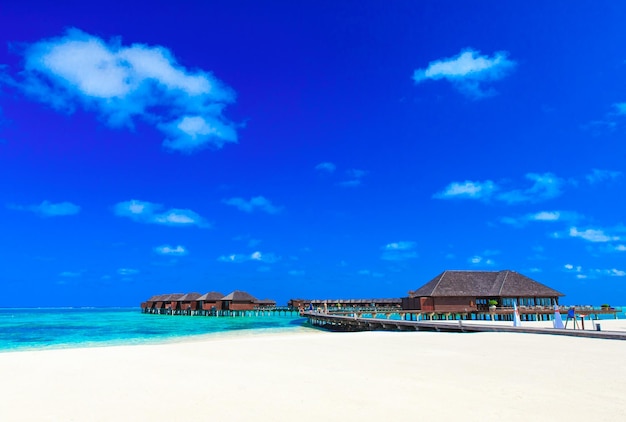strand met waterbungalows Malediven