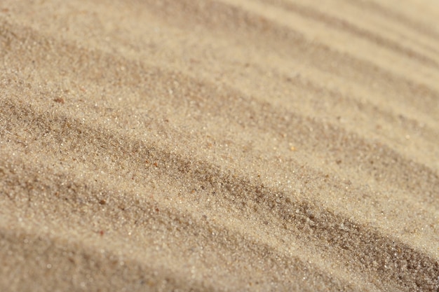 Strandzand als achtergrondstructuur