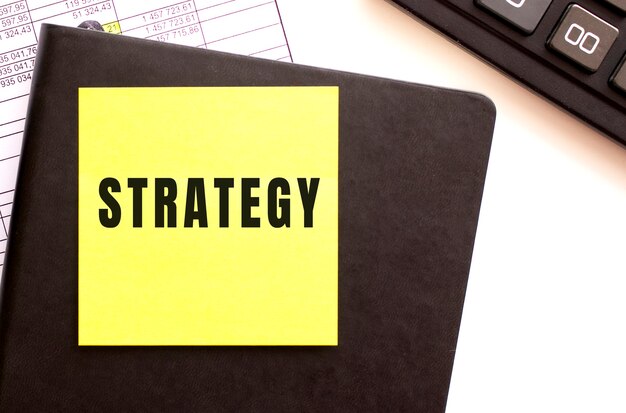 STRATEGY text on a sticker on your desktop