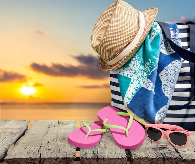 straw hat and  basket for beach