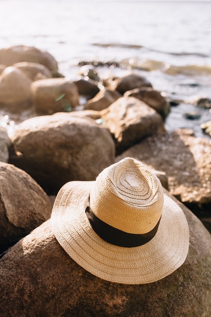 Straw hat on the stone floor