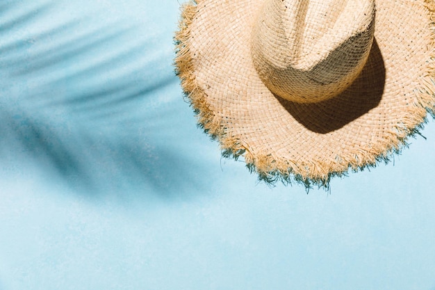 a straw hat with a straw hat in the foreground