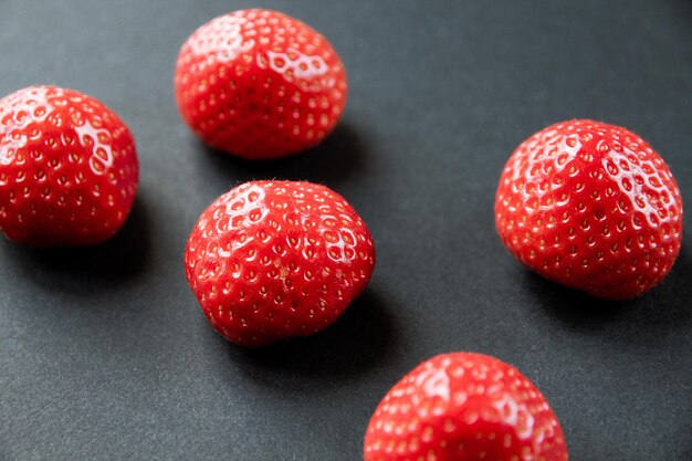 Strawberries on black table Studio shooting