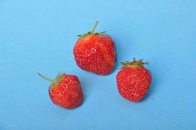 Strawberries on a blue background