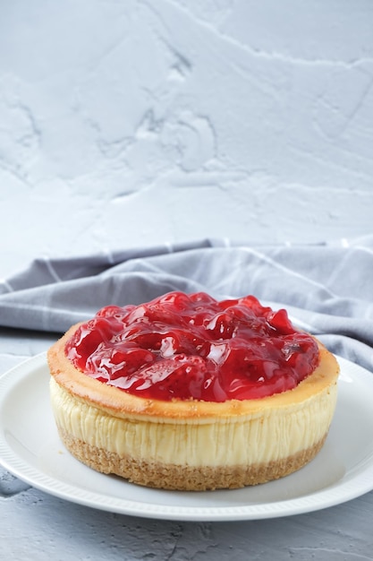 Strawberries cheesecake with white background