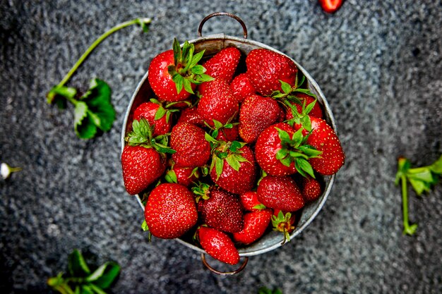 Strawberries in grey bowl. Fresh strawberries. Beautiful strawberries.