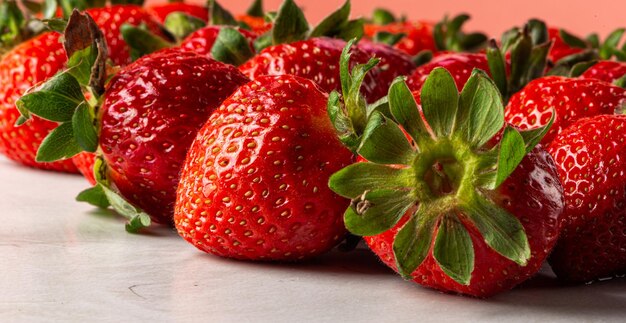 Strawberries on marbled background on gray background