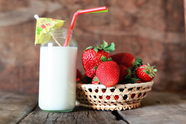 Strawberries and milk in a glass