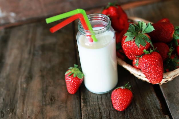 Strawberries and milk in a glass