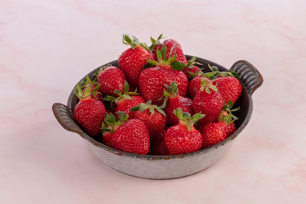 Strawberries in an old grey enamelled dish