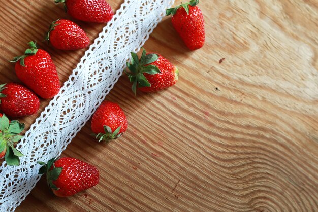 Strawberries top on wooden background