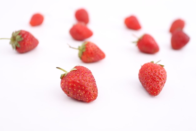 Strawberries on a white backdrop.