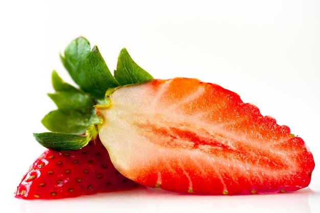 Strawberries on a white background. Isolated strawberry.Sliced berry.Sliced strawberries