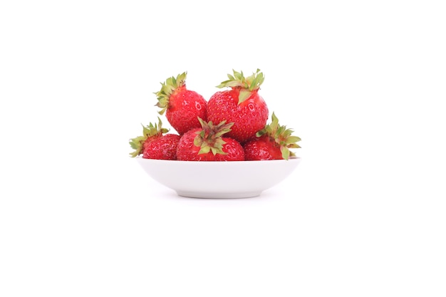 Strawberries on the white plate