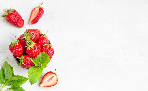 Strawberries with mint leaves