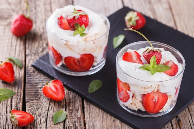 Strawberries with whipped cream and meringue