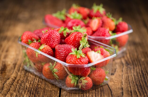 Strawberries on wooden background selective focus