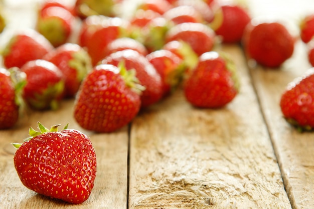 Strawberries on wooden table