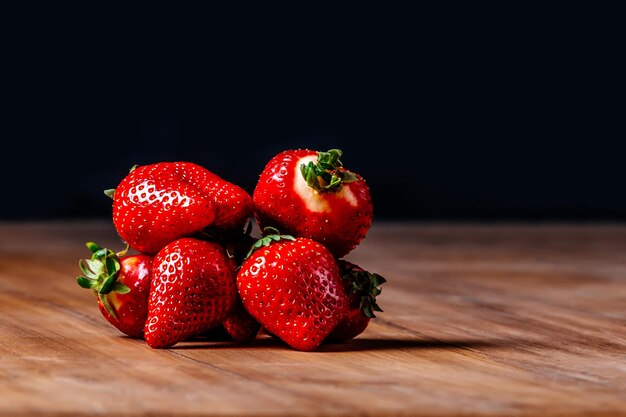 Strawberries on a wooden table