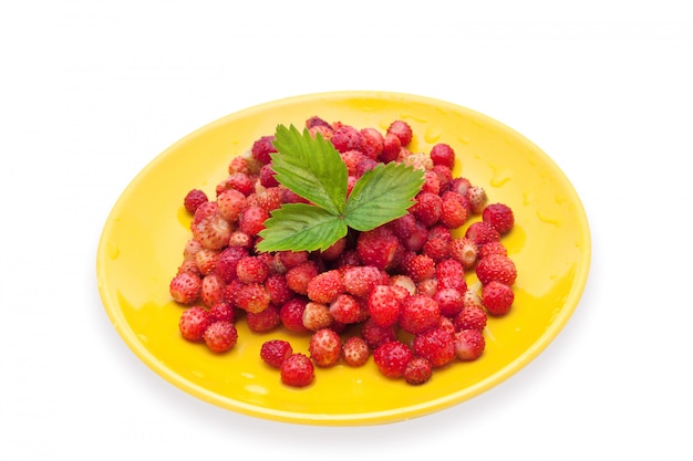 Strawberries in a yellow plate