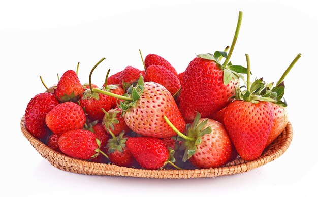 Strawberry in basket on white background