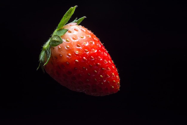 Strawberry black background