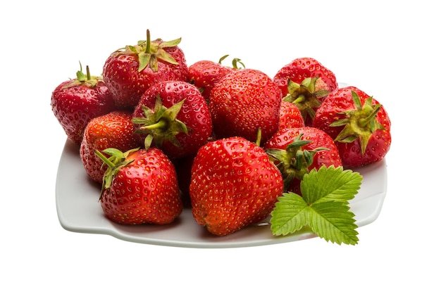 Strawberry in the bowl with leaf