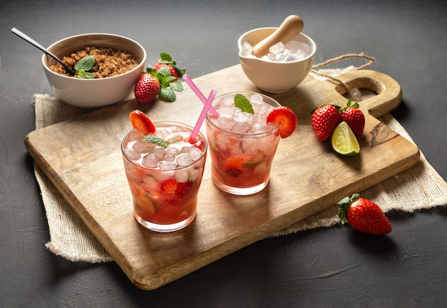 Strawberry Caipirinha, lime, fresh mint, brown sugar and crushed ice