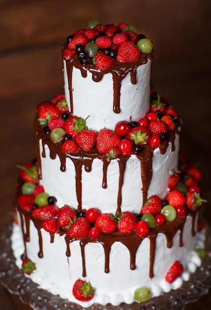 Strawberry cake on a wooden background.