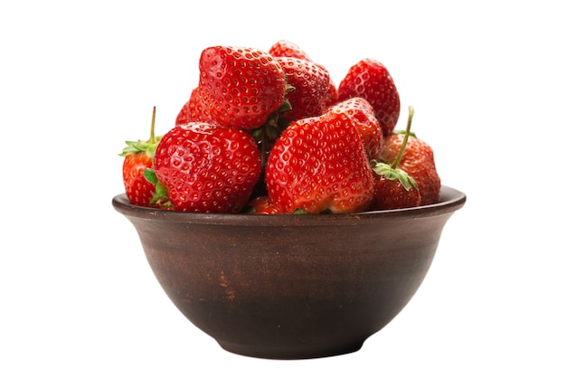 Strawberry in ceramic brown bowl