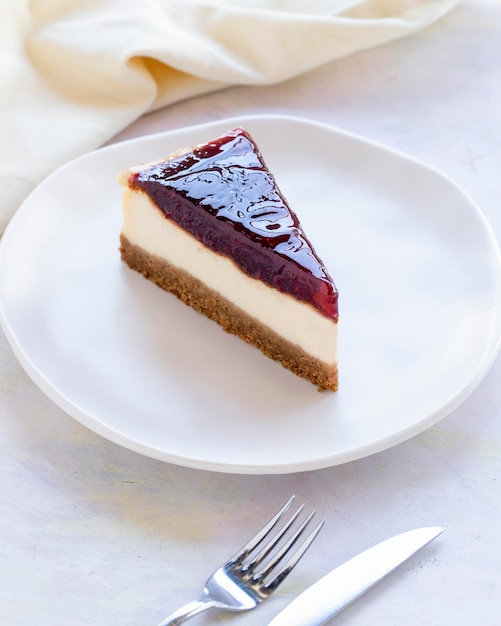 Strawberry cheesecake on wooden background