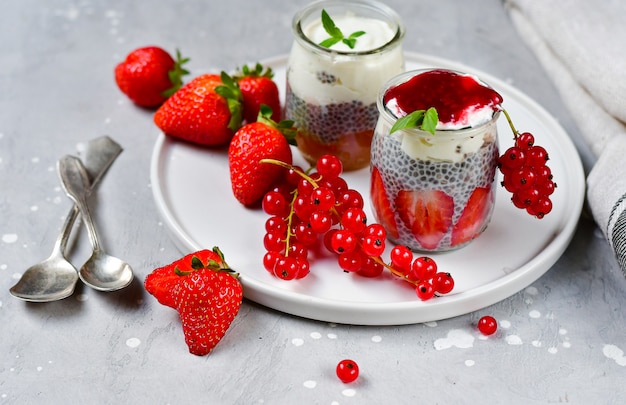 strawberry chia pudding with yogurt, red currants and jam